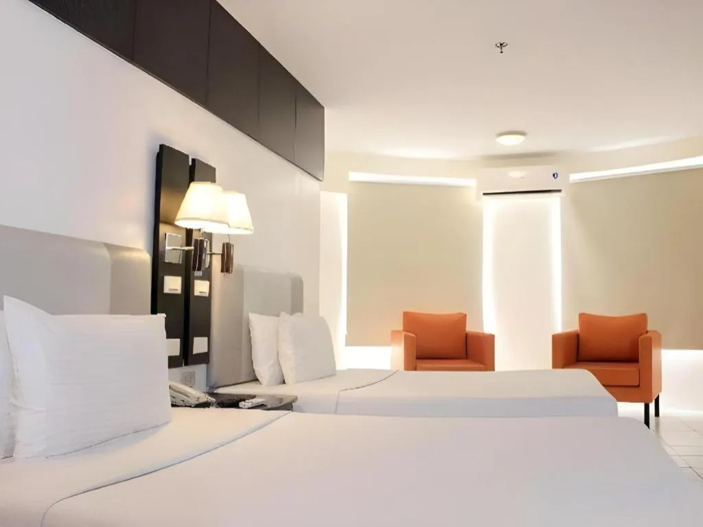 Bed in Majestic Hotel Manila - Formerly Octagon Mansion Hotel Manila