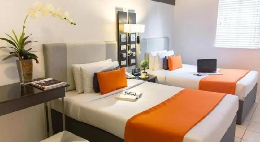 Bed in Majestic Hotel Manila - Formerly Octagon Mansion Hotel Manila