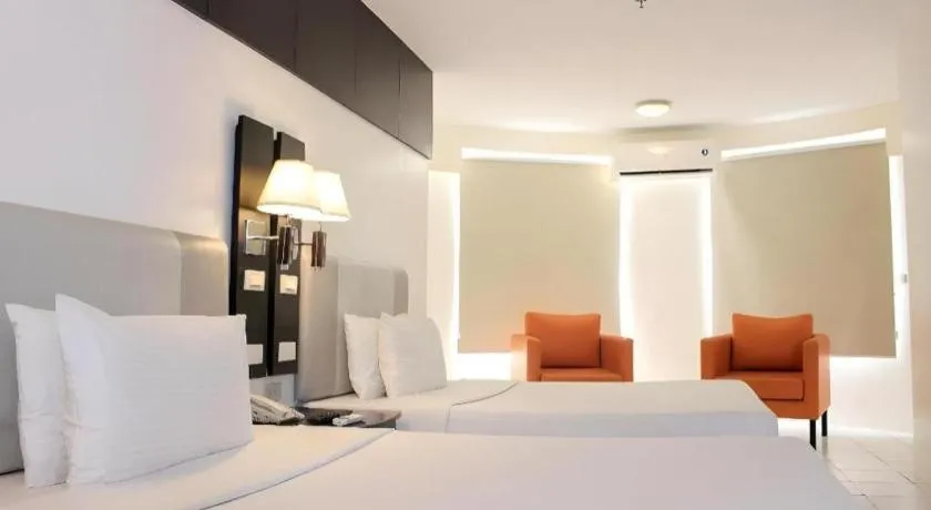 Bed in Majestic Hotel Manila - Formerly Octagon Mansion Hotel Manila