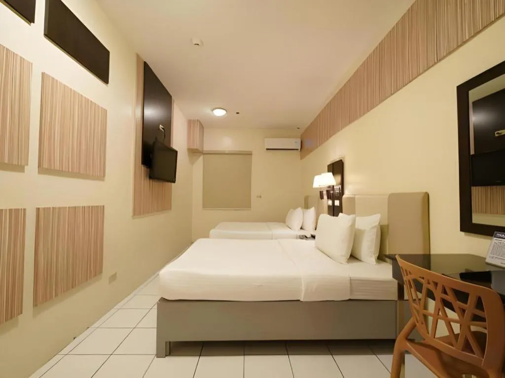 Bed in Majestic Hotel Manila - Formerly Octagon Mansion Hotel Manila