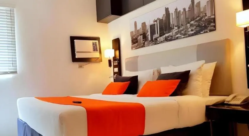 Bed in Majestic Hotel Manila - Formerly Octagon Mansion Hotel Manila