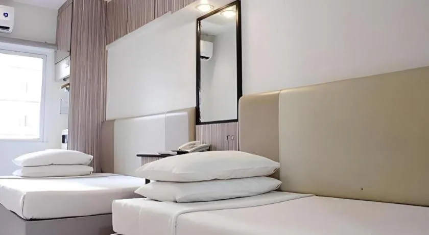 Bed in Majestic Hotel Manila - Formerly Octagon Mansion Hotel Manila