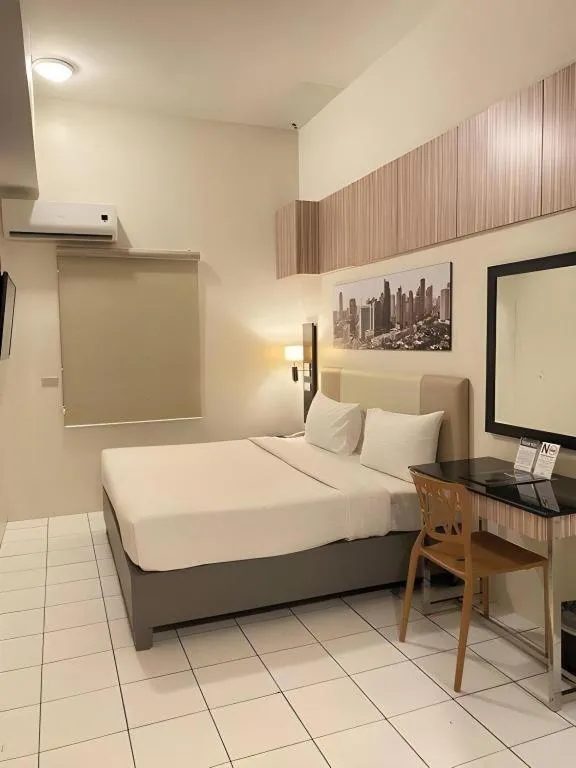 Bed in Majestic Hotel Manila - Formerly Octagon Mansion Hotel Manila