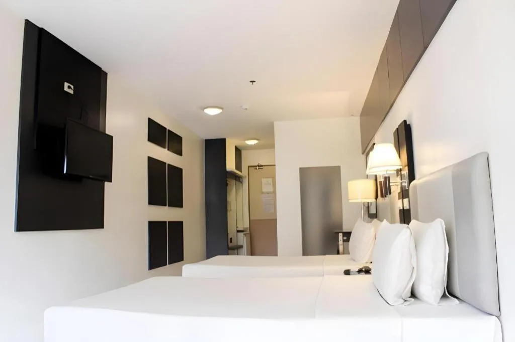 Bed in Majestic Hotel Manila - Formerly Octagon Mansion Hotel Manila