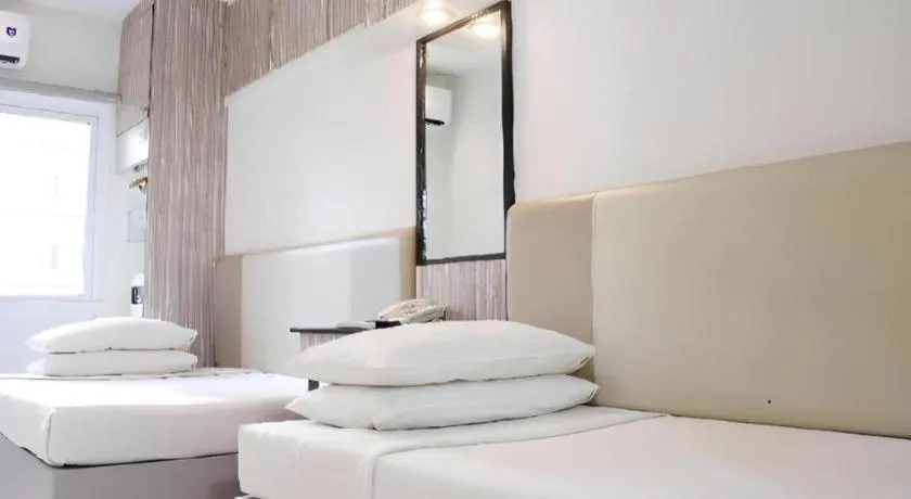 Bed in Majestic Hotel Manila - Formerly Octagon Mansion Hotel Manila