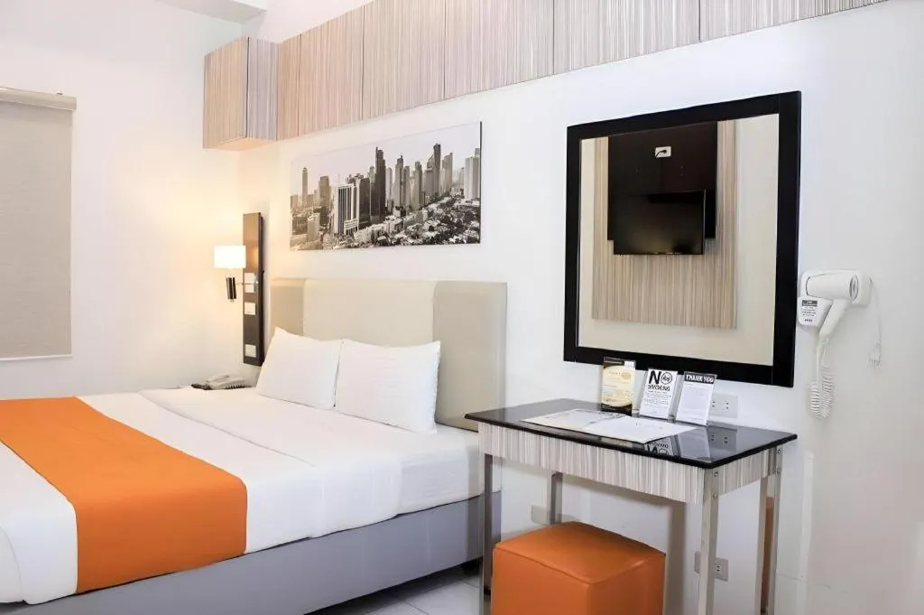 Bed in Majestic Hotel Manila - Formerly Octagon Mansion Hotel Manila