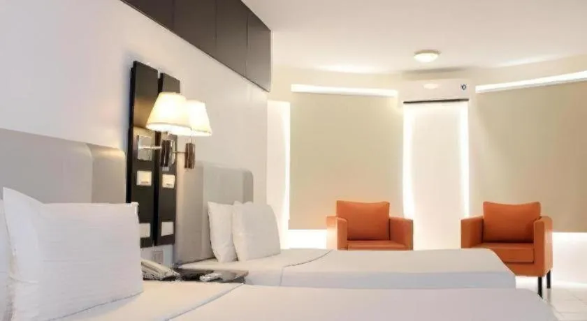 Bed in Majestic Hotel Manila - Formerly Octagon Mansion Hotel Manila