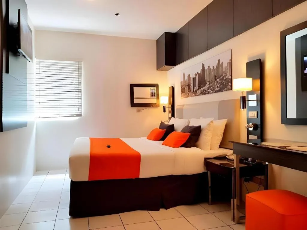 Bed in Majestic Hotel Manila - Formerly Octagon Mansion Hotel Manila