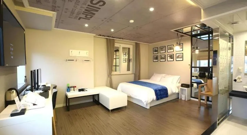 Bed in Jeju Lux Hotel