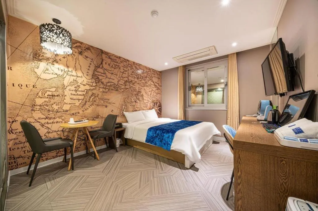 Bed in Jeju Lux Hotel