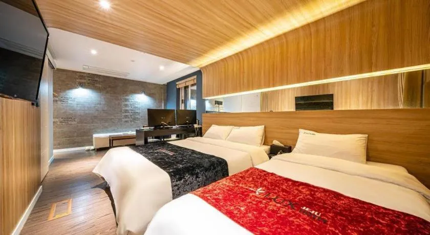 Bed in Jeju Lux Hotel