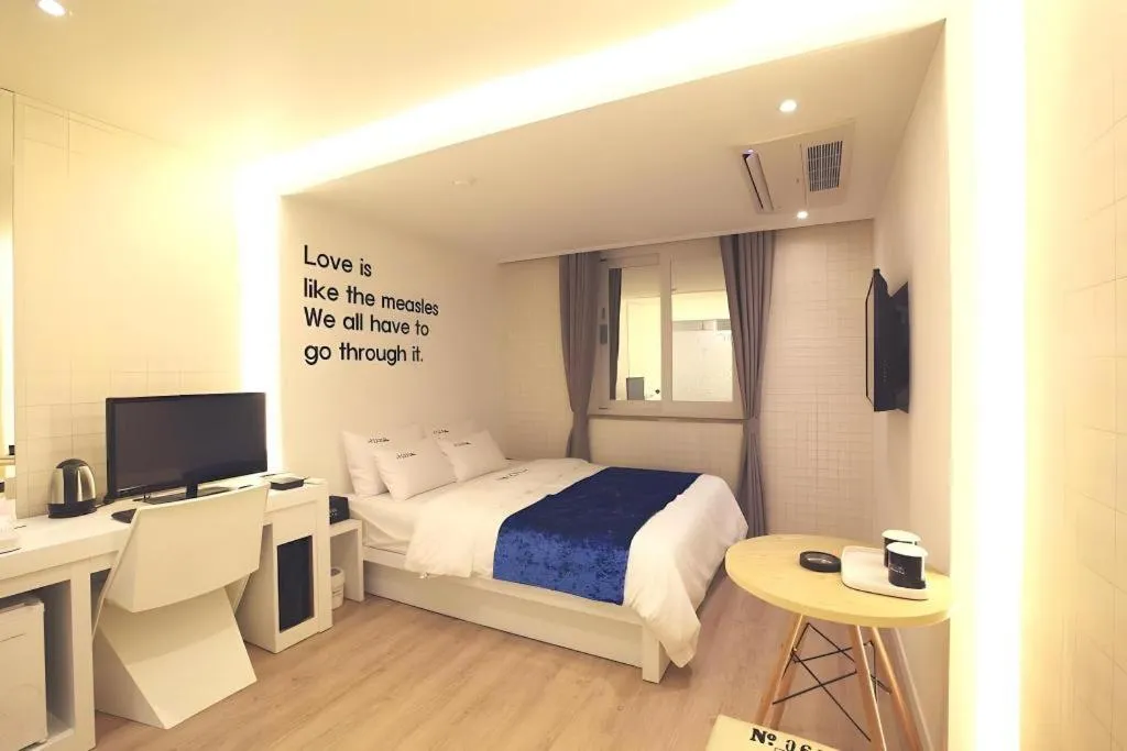 Bed in Jeju Lux Hotel