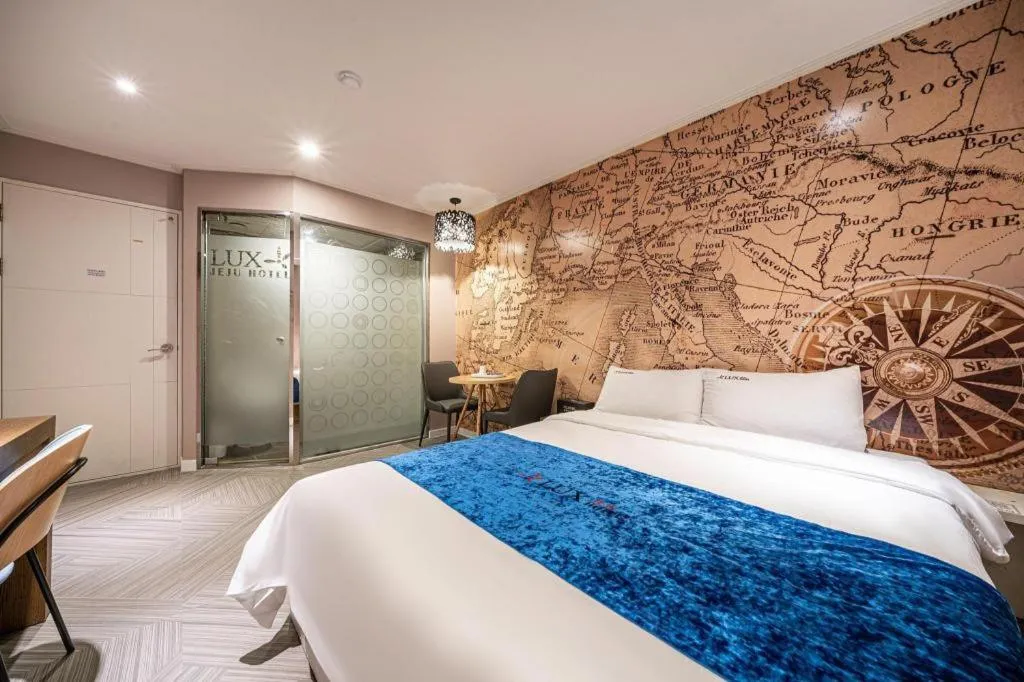 Bed in Jeju Lux Hotel