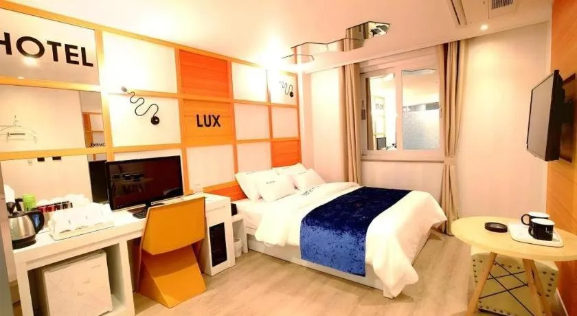 Bed in Jeju Lux Hotel