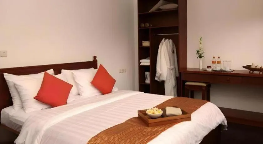 Bed in Hotel Amira Pasteur