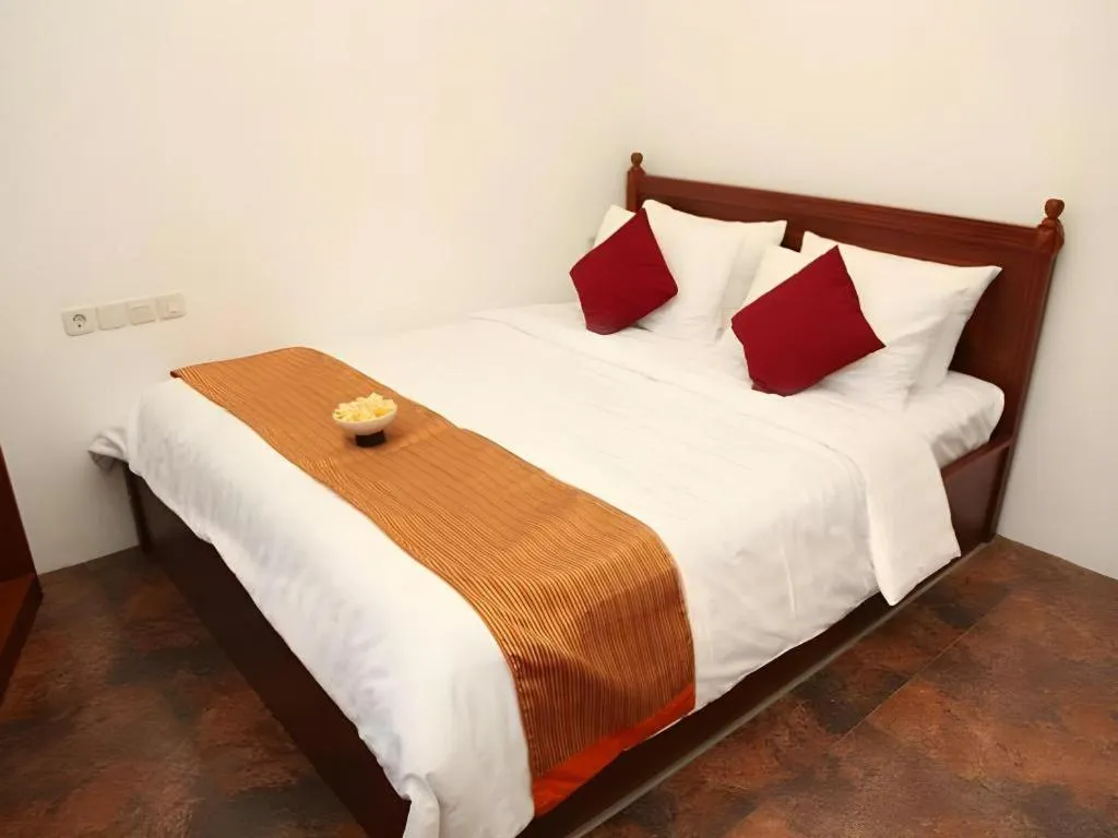 Bed in Hotel Amira Pasteur