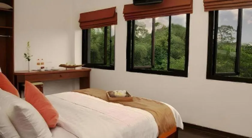 Bed in Hotel Amira Pasteur