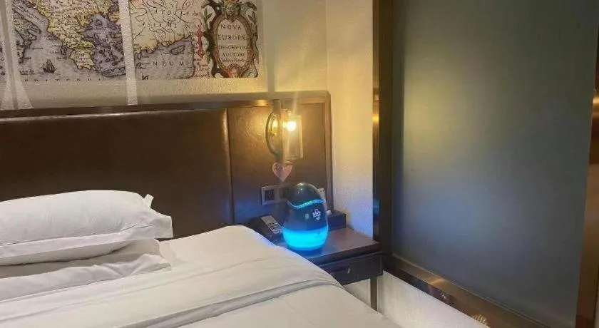 Bed in James Joyce Coffetel Xi'an Lingtong The Terracotta Army Huaqingchi University Town Metro Station