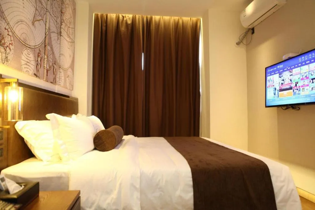 Bed in James Joyce Coffetel Xi'an Lingtong The Terracotta Army Huaqingchi University Town Metro Station