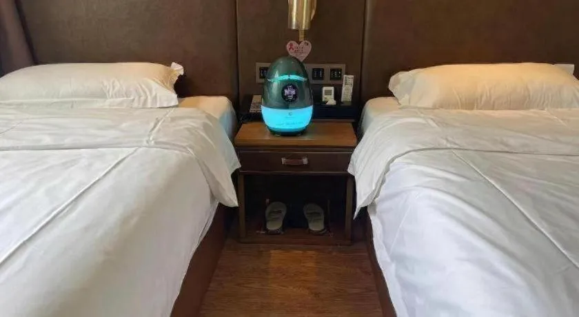 Bed in James Joyce Coffetel Xi'an Lingtong The Terracotta Army Huaqingchi University Town Metro Station