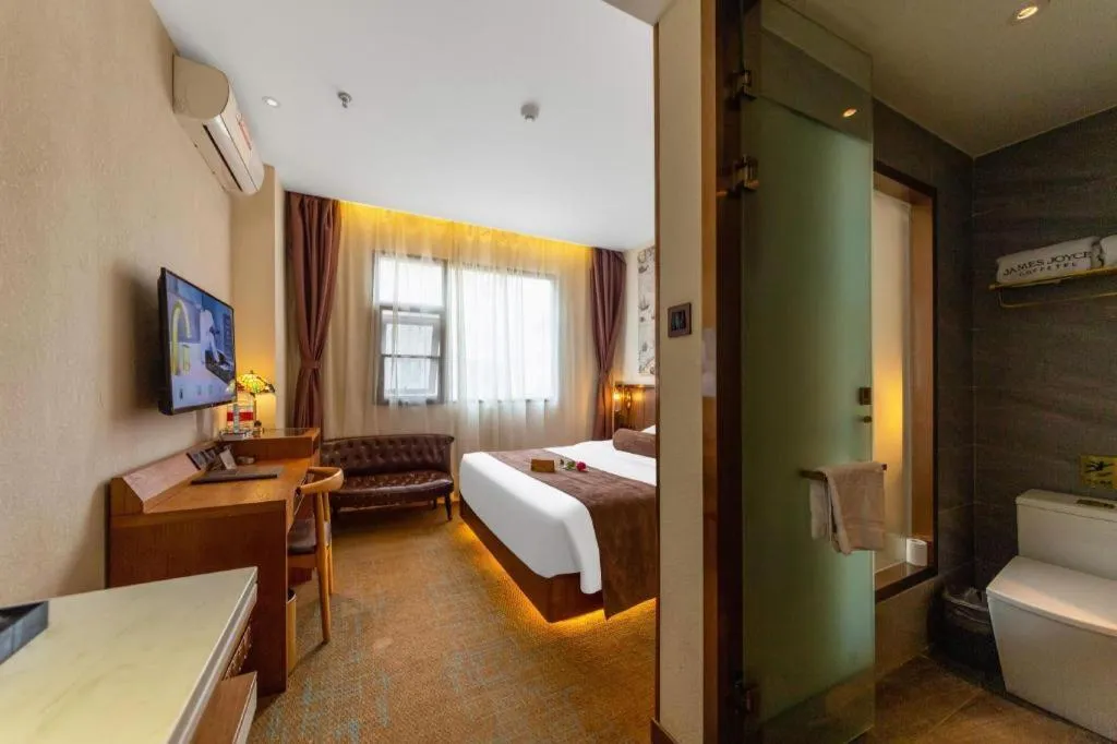 Bed in James Joyce Coffetel Xi'an Lingtong The Terracotta Army Huaqingchi University Town Metro Station