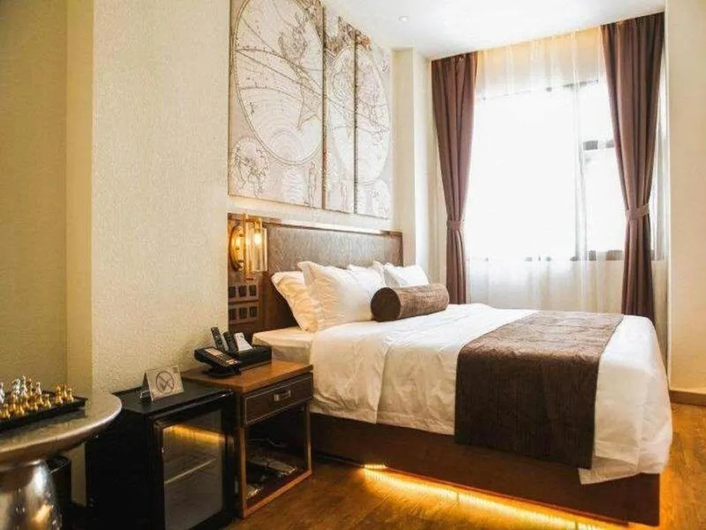 Bed in James Joyce Coffetel Xi'an Lingtong The Terracotta Army Huaqingchi University Town Metro Station