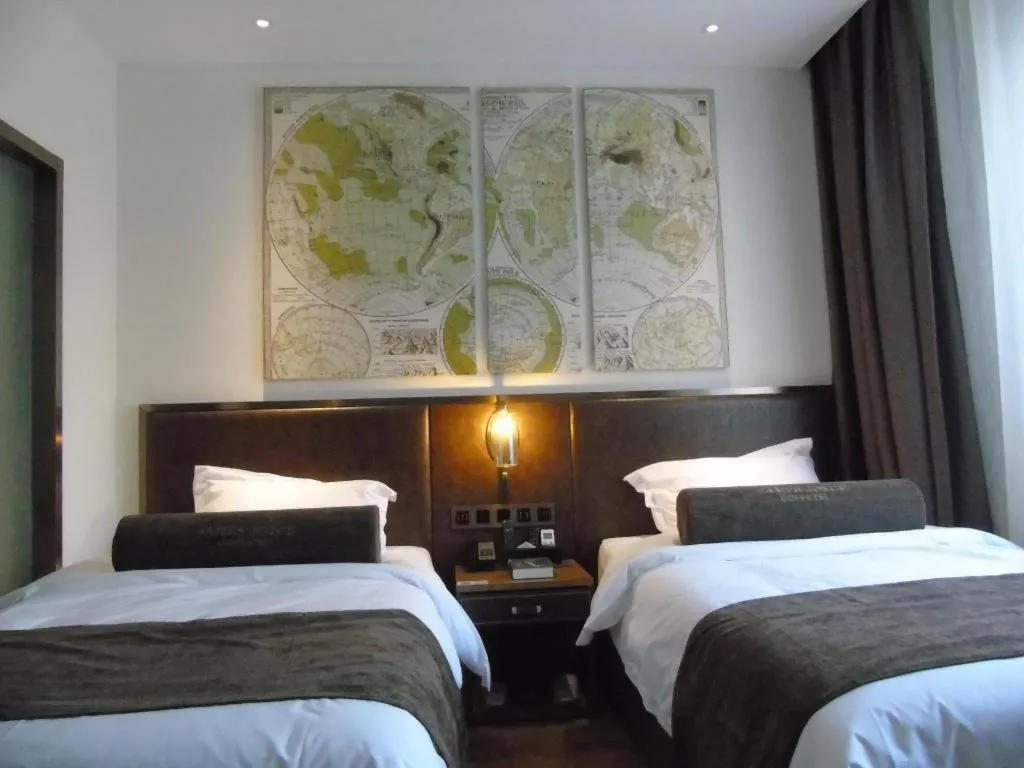 Bed in James Joyce Coffetel Xi'an Lingtong The Terracotta Army Huaqingchi University Town Metro Station