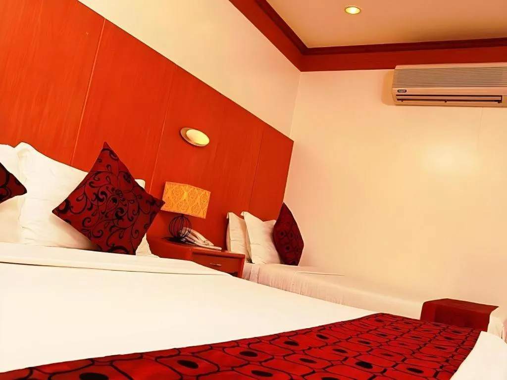 Bed in Naga Land Hotel