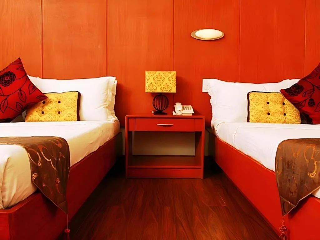 Bed in Naga Land Hotel