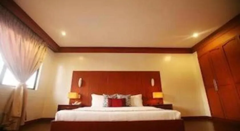 Bed in Naga Land Hotel