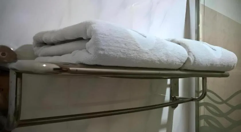 Bed in Naga Land Hotel