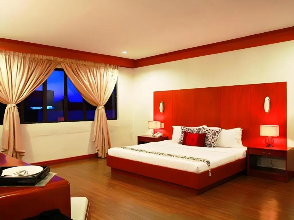 Bed in Naga Land Hotel