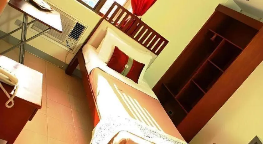 Bed in Naga Land Hotel