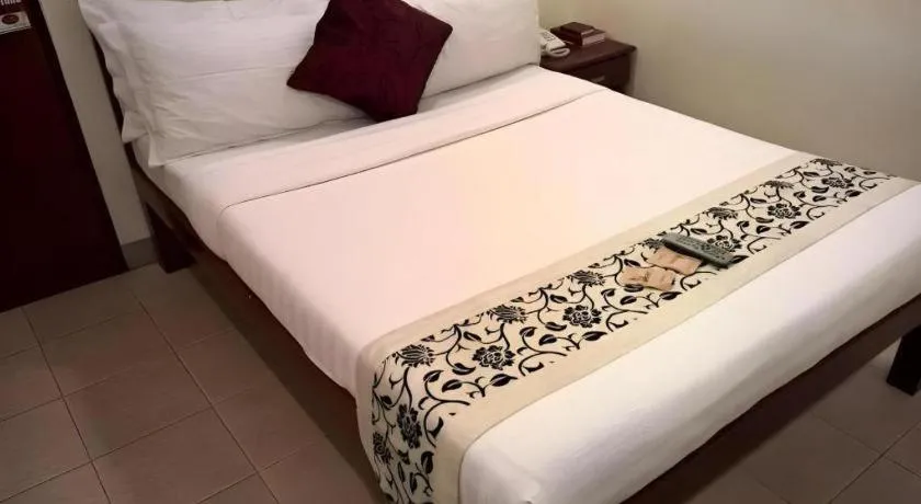 Bed in Naga Land Hotel