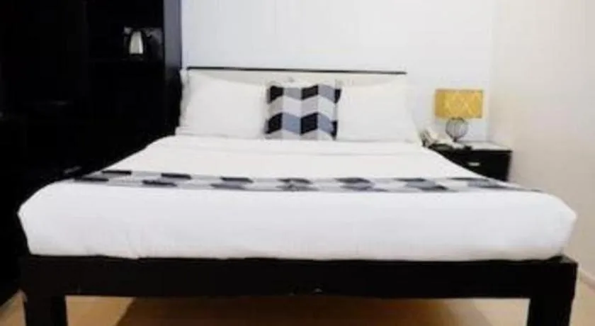 Bed in Naga Land Hotel