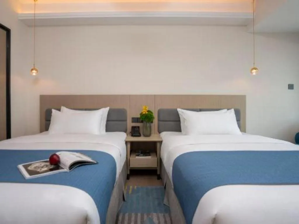 Bed in Kunming Guihua Hotel