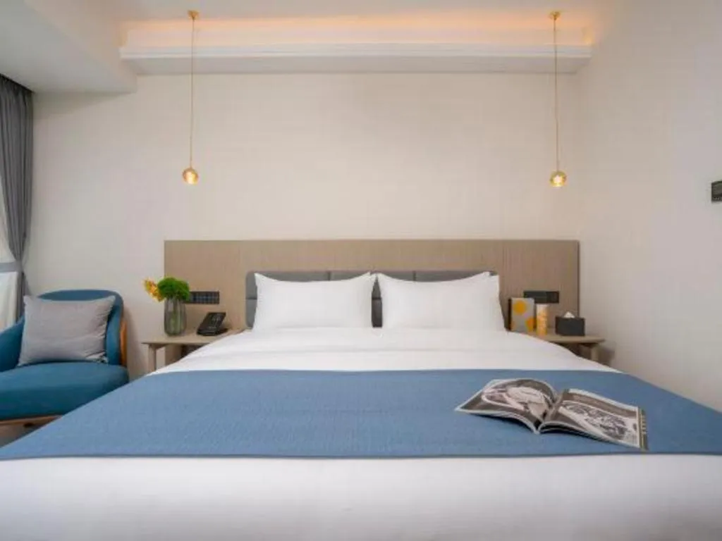 Bed in Kunming Guihua Hotel