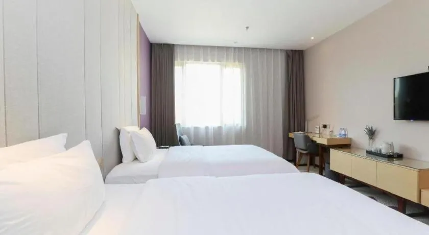 Bed in Lavande Hotel Zhongshan Dayong Rosewood Cultural Expo City