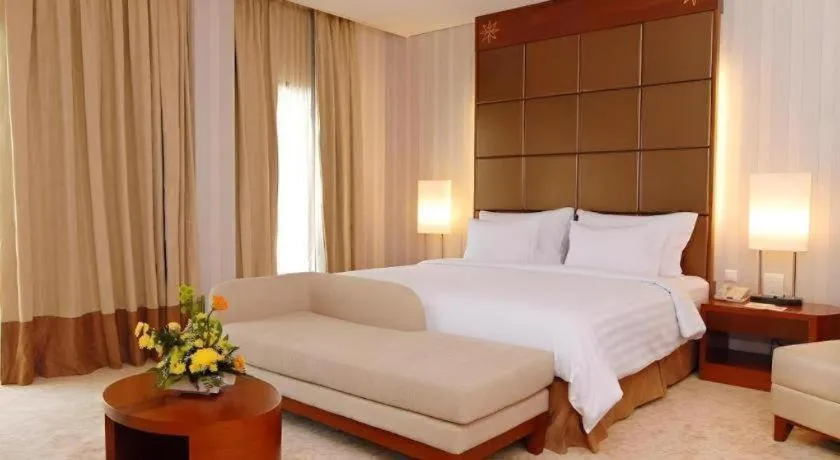 Bed in Labersa Grand Hotel &Convention Center