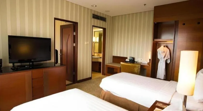Bed in Labersa Grand Hotel &Convention Center
