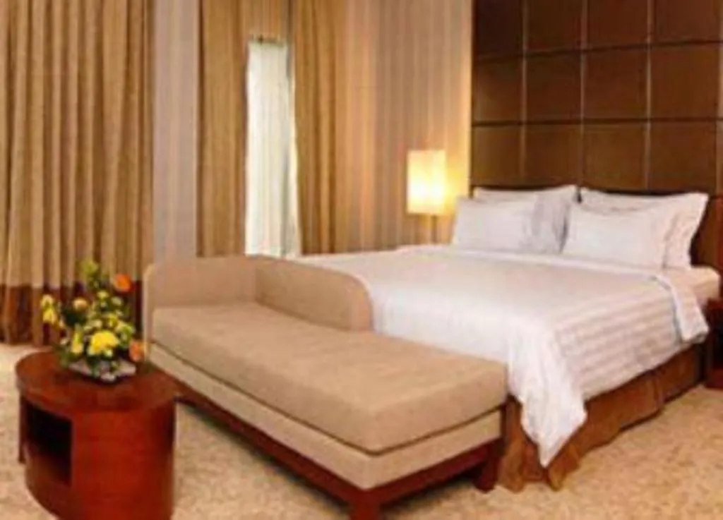 Bed in Labersa Grand Hotel &Convention Center