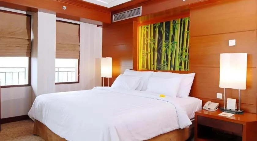 Bed in Labersa Grand Hotel &Convention Center