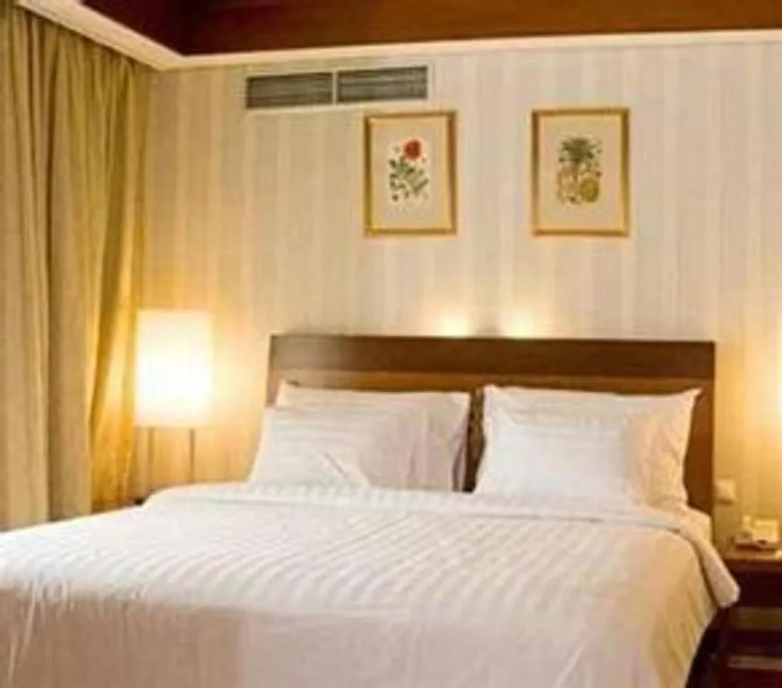 Bed in Labersa Grand Hotel &Convention Center