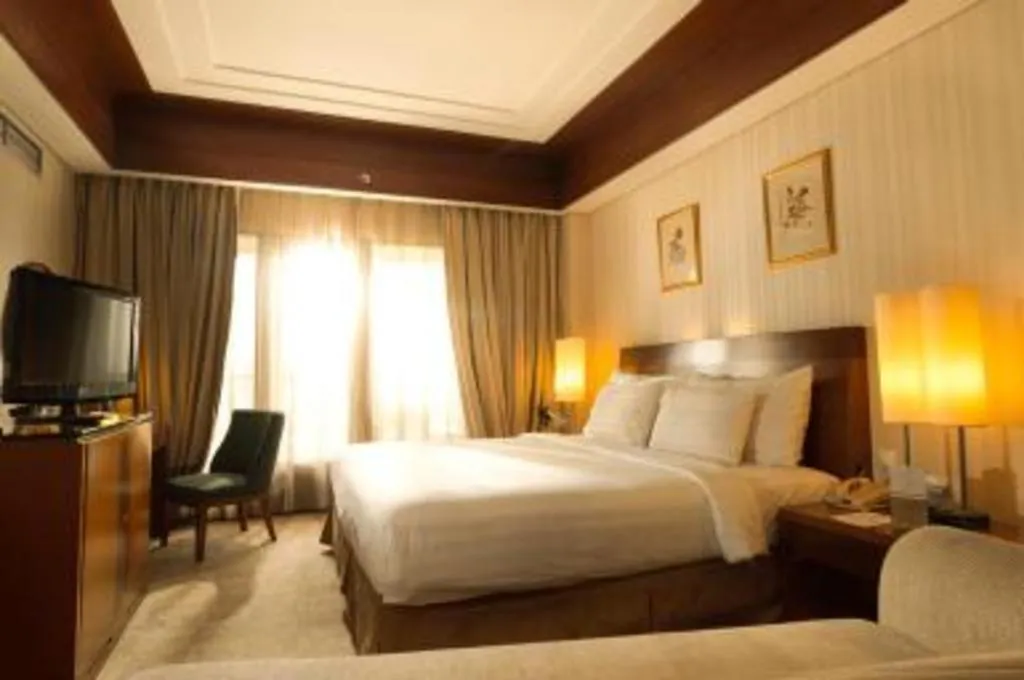 Bed in Labersa Grand Hotel &Convention Center
