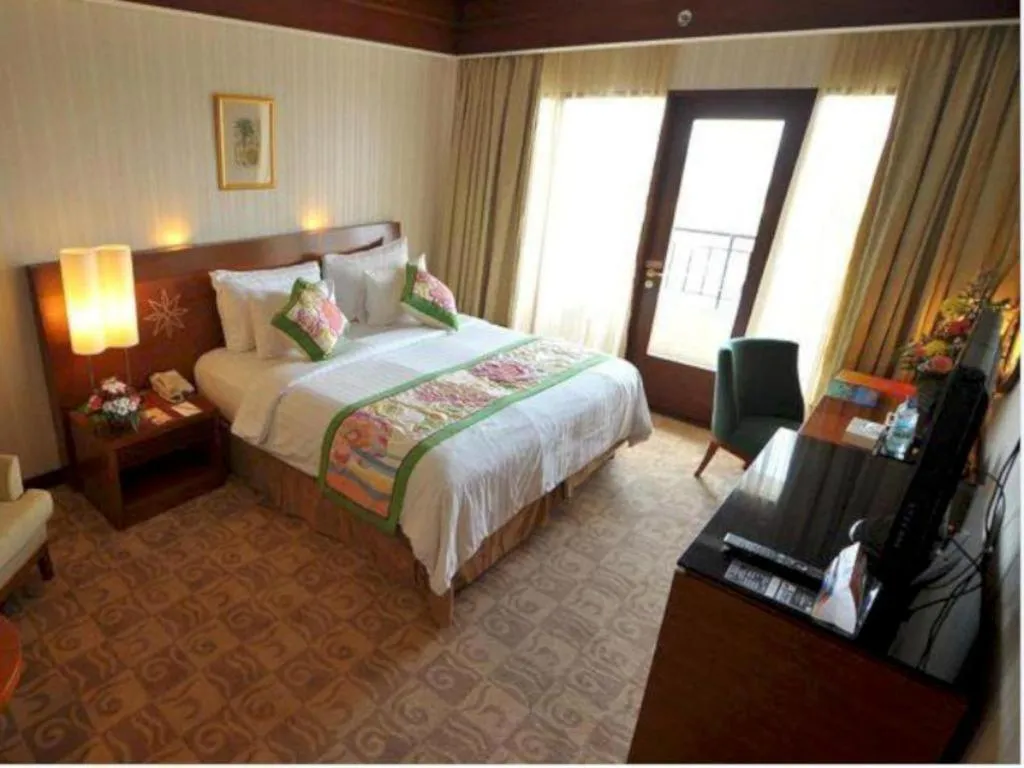 Bed in Labersa Grand Hotel &Convention Center