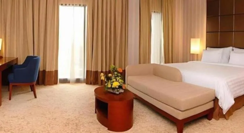 Bed in Labersa Grand Hotel &Convention Center