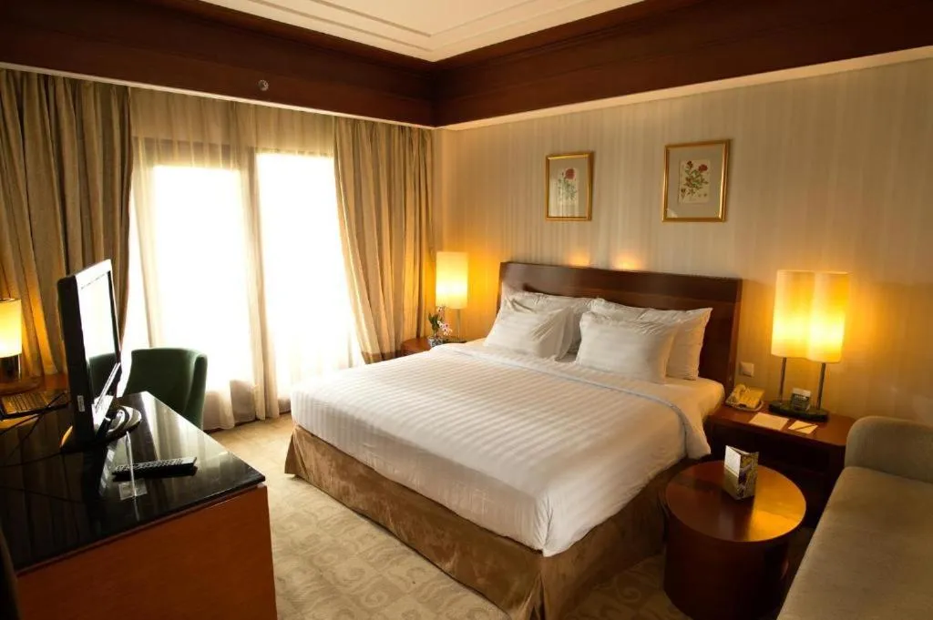 Bed in Labersa Grand Hotel &Convention Center