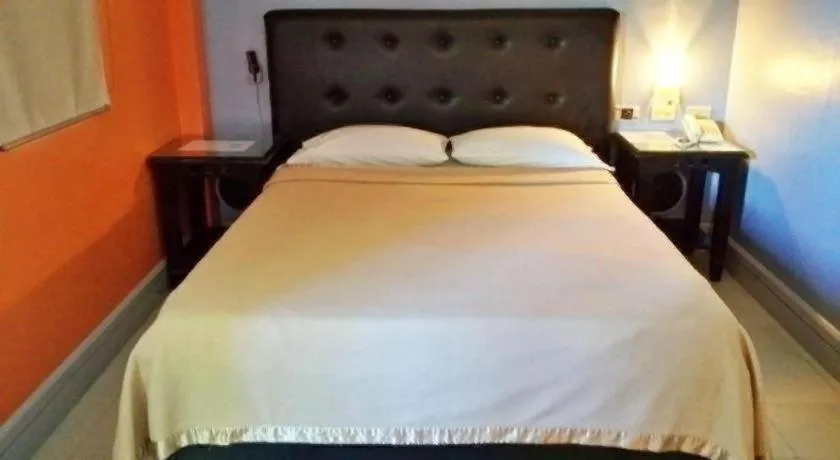 Bed in Jardin de Rosal Hotel