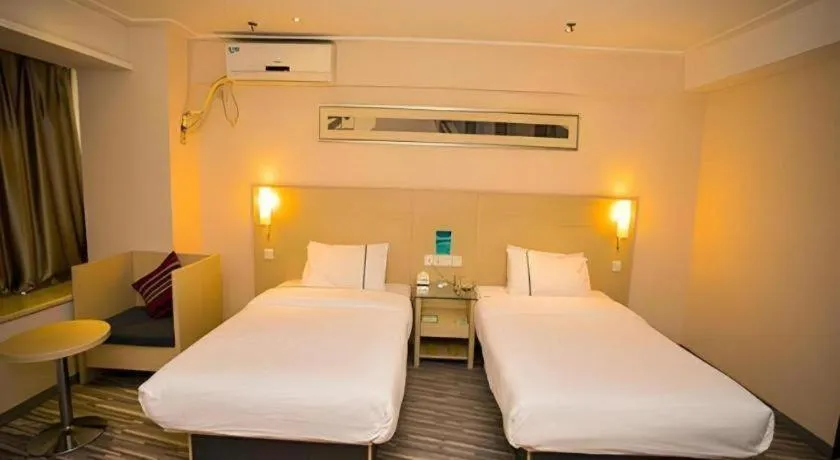 Bed in City Comfort Inn Wuhan Jiangxia