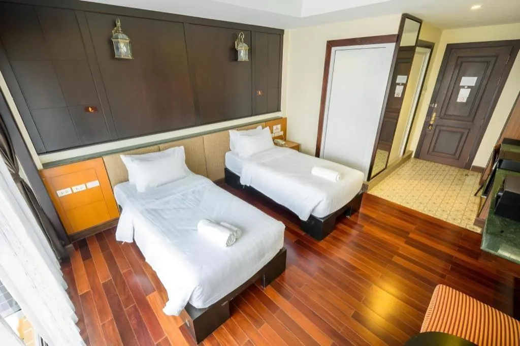 Bed in LANDMARK NAKHONPHANOM HOTEL